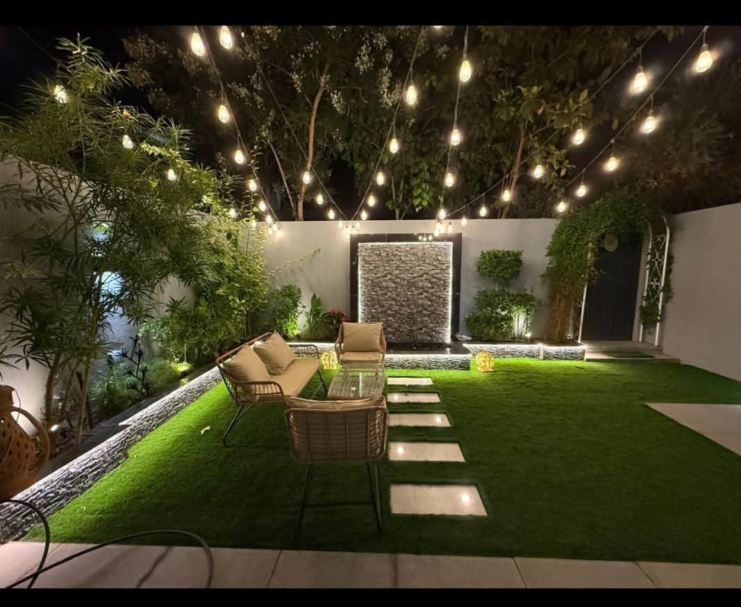 GreenFix team shaping a garden in Dubai